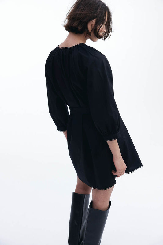 Small ring trim dress